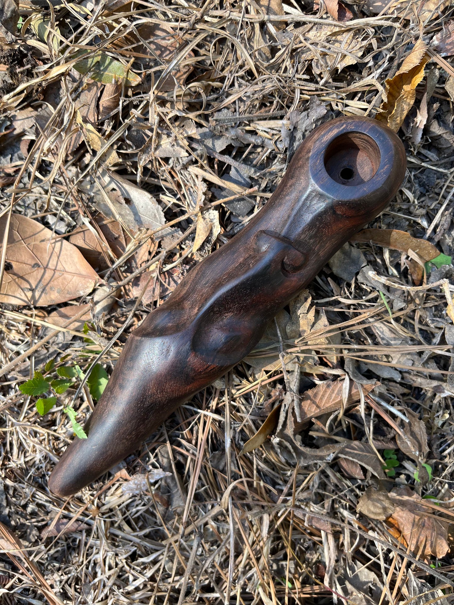 Pipa de tabaco con cara de espíritu ancestral